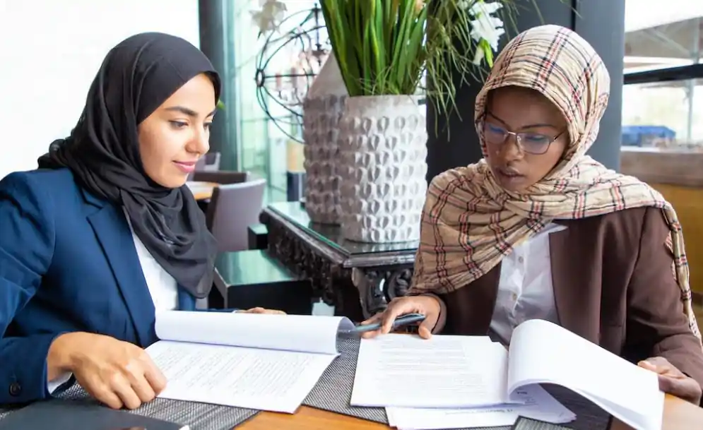 A university student in Dubai receiving professional academic support with an assignment