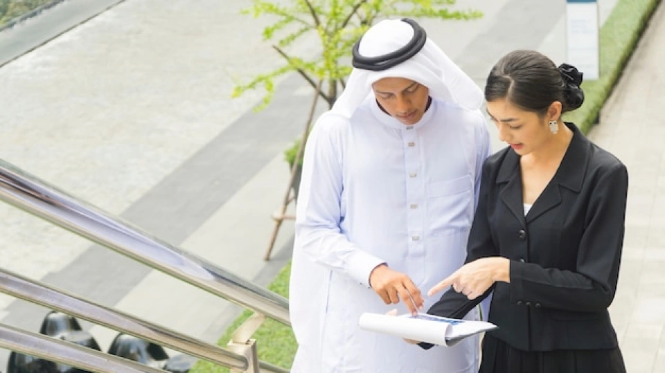 Student receiving confidential data analysis help in Ajman with secure handling of research data and academic information.