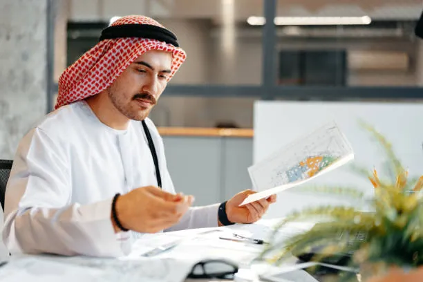 Student receiving confidential literature review writing help in Abu Dhabi with secure handling of research materials and academic information.