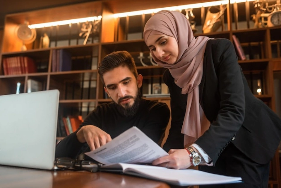 Professional dissertation writer preparing a research project for a student using dissertation writing help in Ajman.