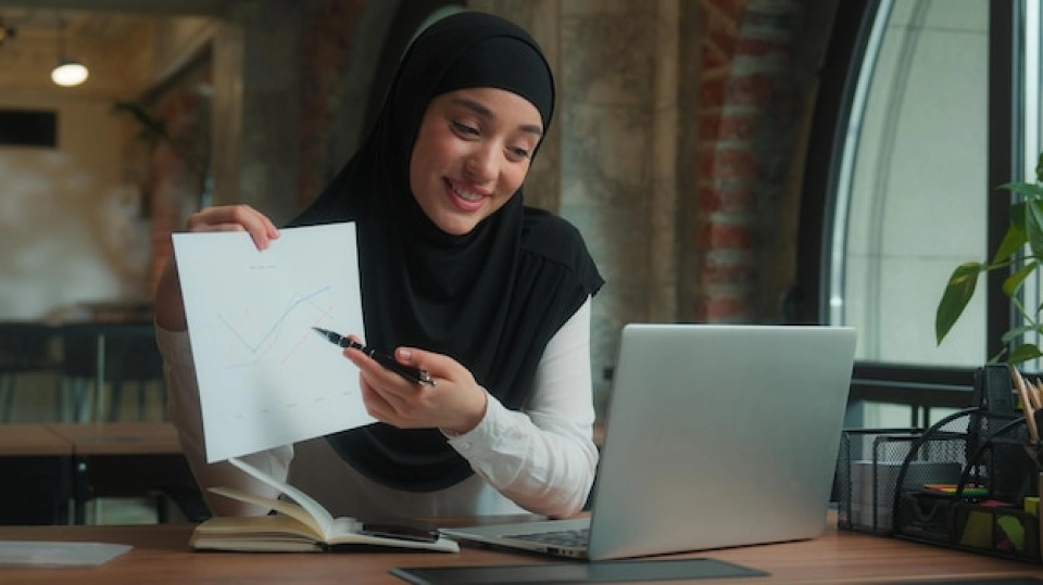 Professional essay writer preparing a university essay for a student using essay writing help in Ajman.