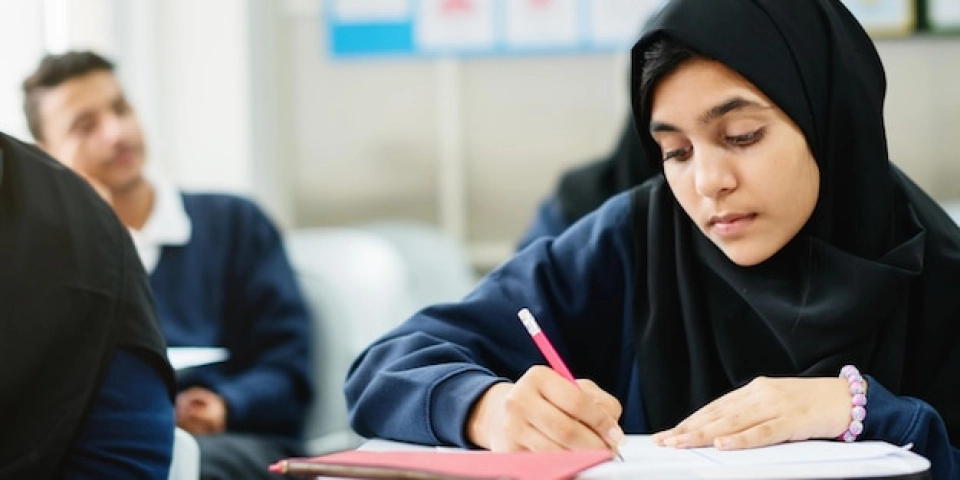 Student using homework help in Ajman while completing university-level coursework with academic guidance and support.