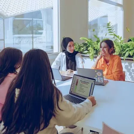 University student receiving coursework report writing help in Sharjah