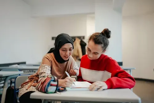 A university student receiving academic writing support for a lab report in Dubai