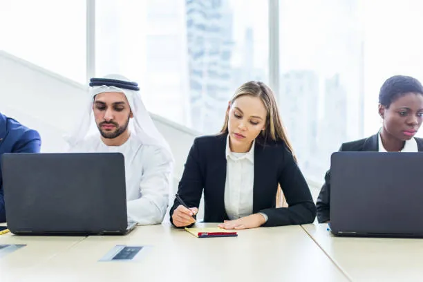 A student in Dubai securely sharing personal resume information with a professional writing service
