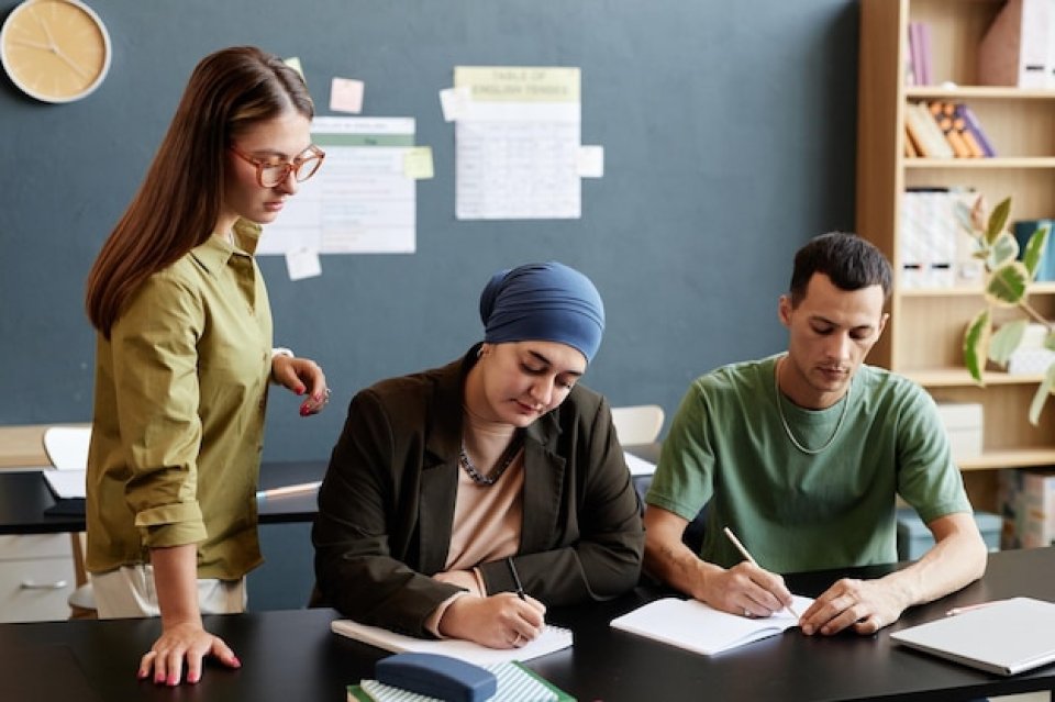 Student receiving confidential coursework report writing help in Sharjah with secure handling of academic documents and personal information.